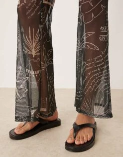 Never Fully Dressed Mesh Flare Trouser Co-ord In Black Palm Print For Women -Never Fully Dressed Sales 208348033 3